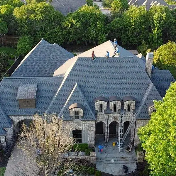 Aerial view of a French-style estate re-roof in progress